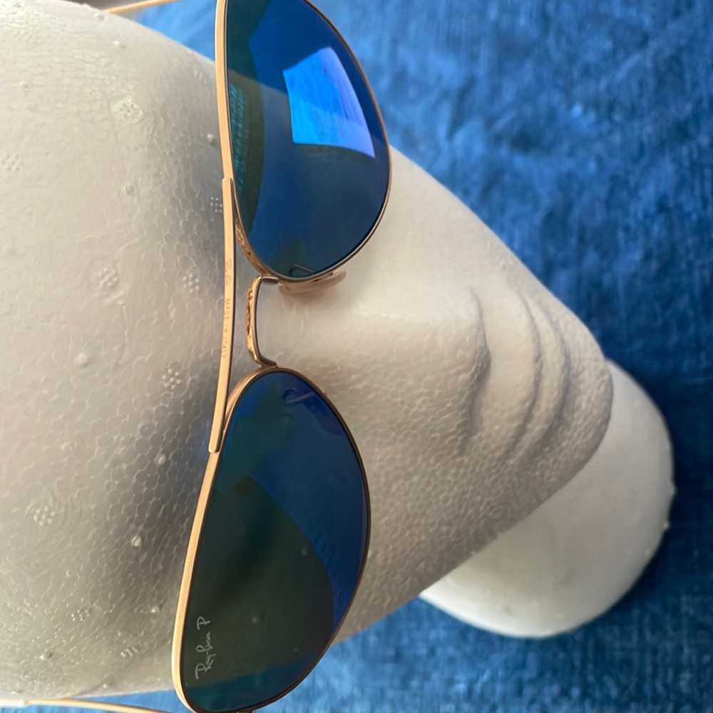Ray Ban polarized 58 mm blue mirror and matte gold aviators. Worn twice.